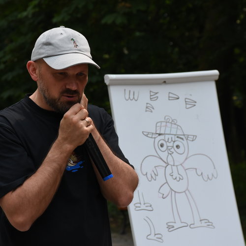 Obraz główny aktualności o tytule Spotkanie autorskie z Tomaszem Samojlikiem 
